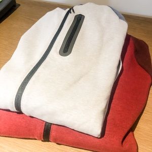 TWO Men’s color-block zip-up sweatshirt.